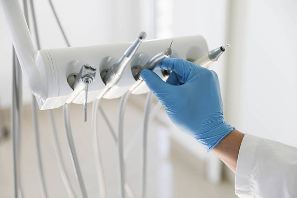 Professional Tooth Extraction technician working in Half Moon, NC
